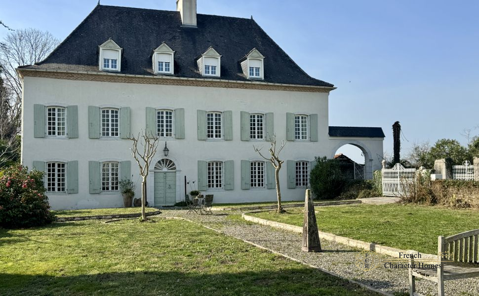 Substantial Village Manor House with River Frontage