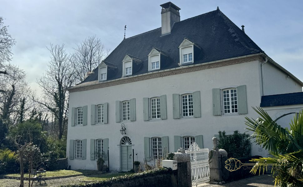 Substantial Village Manor House with River Frontage