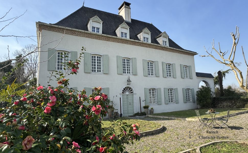 Substantial Village Manor House with River Frontage