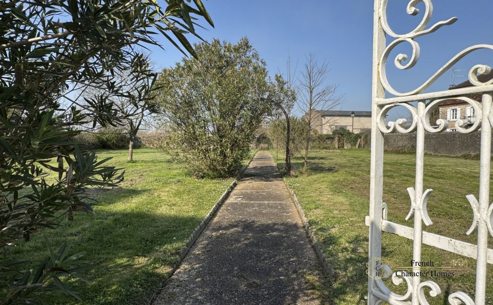 Substantial Village Manor House with River Frontage