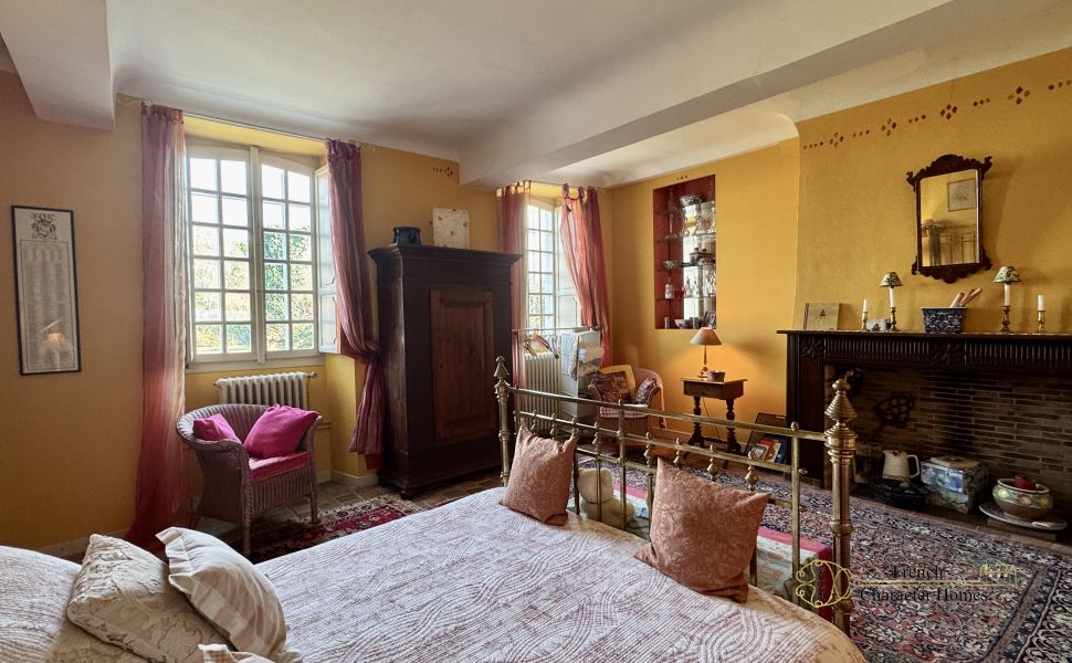 Substantial Village Manor House with River Frontage