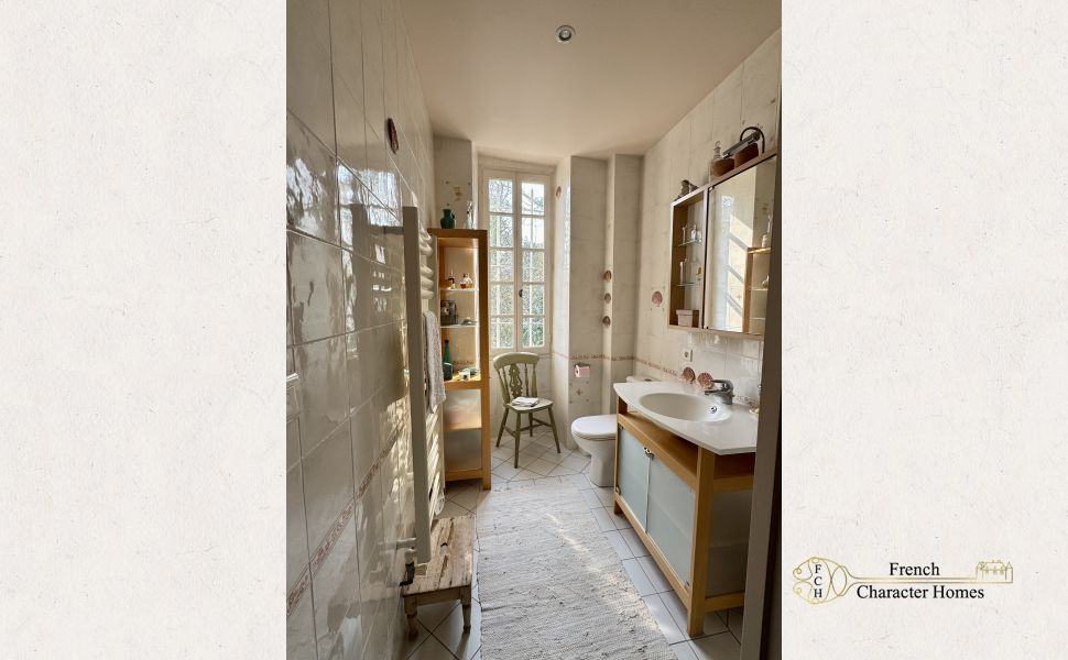 Substantial Village Manor House with River Frontage