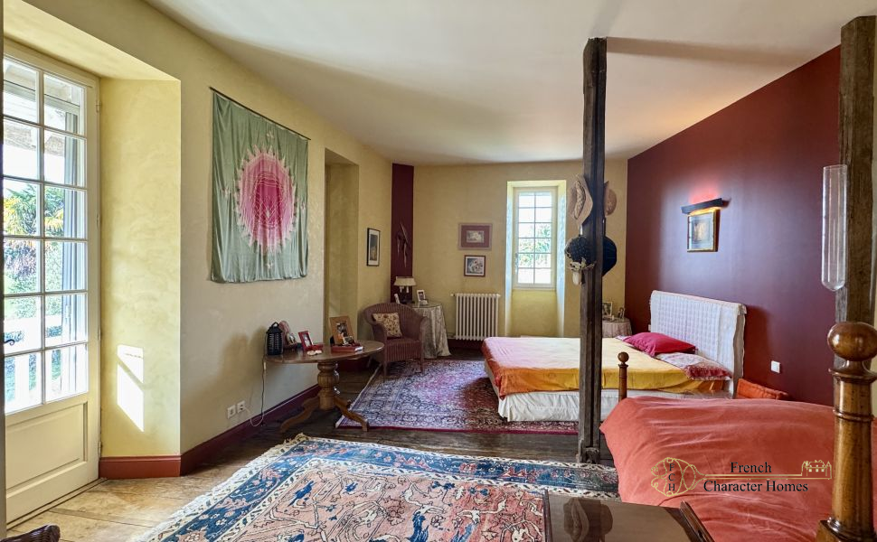 Substantial Village Manor House with River Frontage