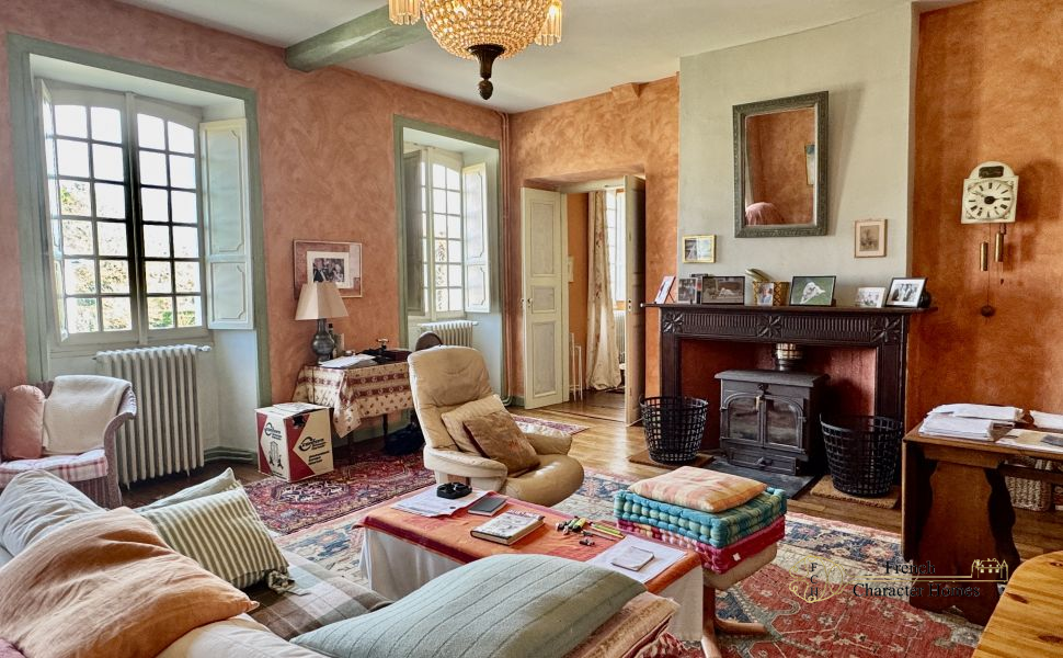 Substantial Village Manor House with River Frontage