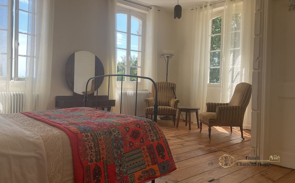 An Authentic 17C Chateau with Guest Cottage & Barns