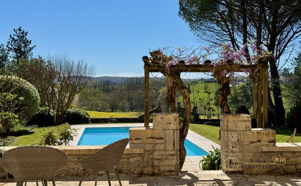An Exceptional 18C Village Manor House with Sweeping Countryside Views to the Rear