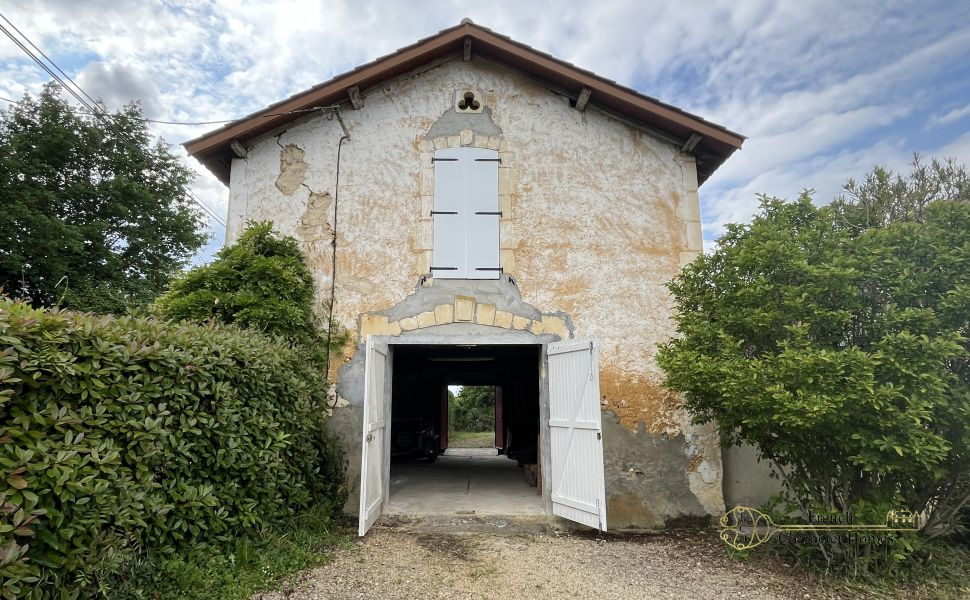 Endless Views at this Pretty Chalossais Property with Gite and Natural Swimming Pool
