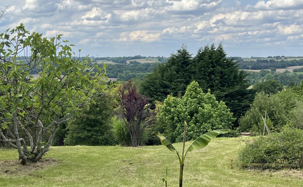 Endless Views at this Pretty Chalossais Property with Gite and Natural Swimming Pool