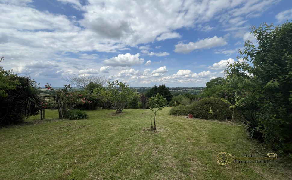 Endless Views at this Pretty Chalossais Property with Gite and Natural Swimming Pool