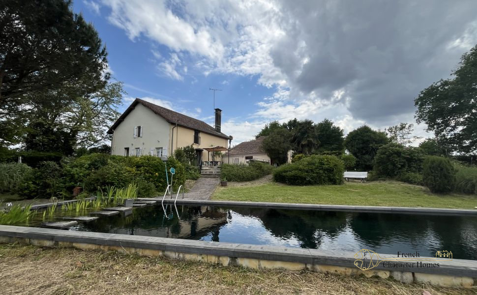 Endless Views at this Pretty Chalossais Property with Gite and Natural Swimming Pool