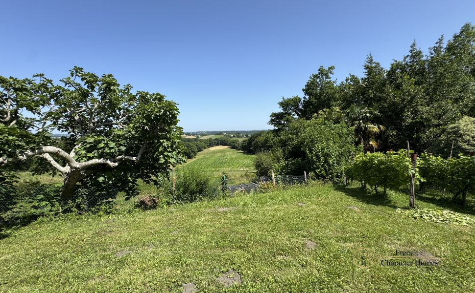 Adorable Village House Built in 1840 With Large Barn, Workshop And Far Reaching Views